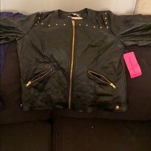 Black leather jacket with gold lining